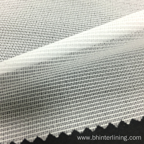 Elastic polyester tricot knitted fusing interlining fabric